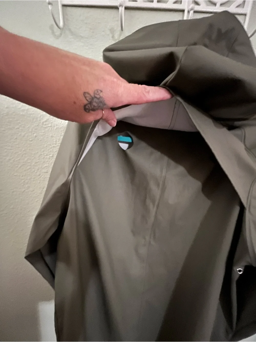Men's Jack and Jones Hooded Olive Green Raincoat with Snap Front.